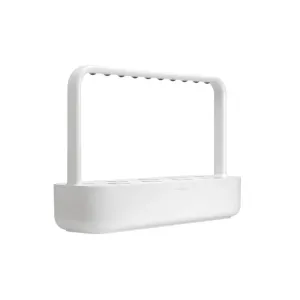 Click & Grow Smart Garden 9 startkit i vitt, en inomhuskruka för bänkskivan med välvd ram för växtbelysning