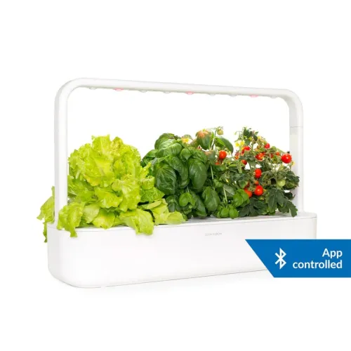 Click and Grow Smart Garden 9 Pro i vitt, rektangulär odlingslåda med bågformad LED-arm över örter, sallad och tomater; badge App controlled.