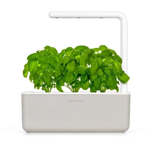Jardin d’herbes aromatiques d’intérieur Click & Grow Smart Garden 3 avec plants de basilic et cadre lumineux LED blanc